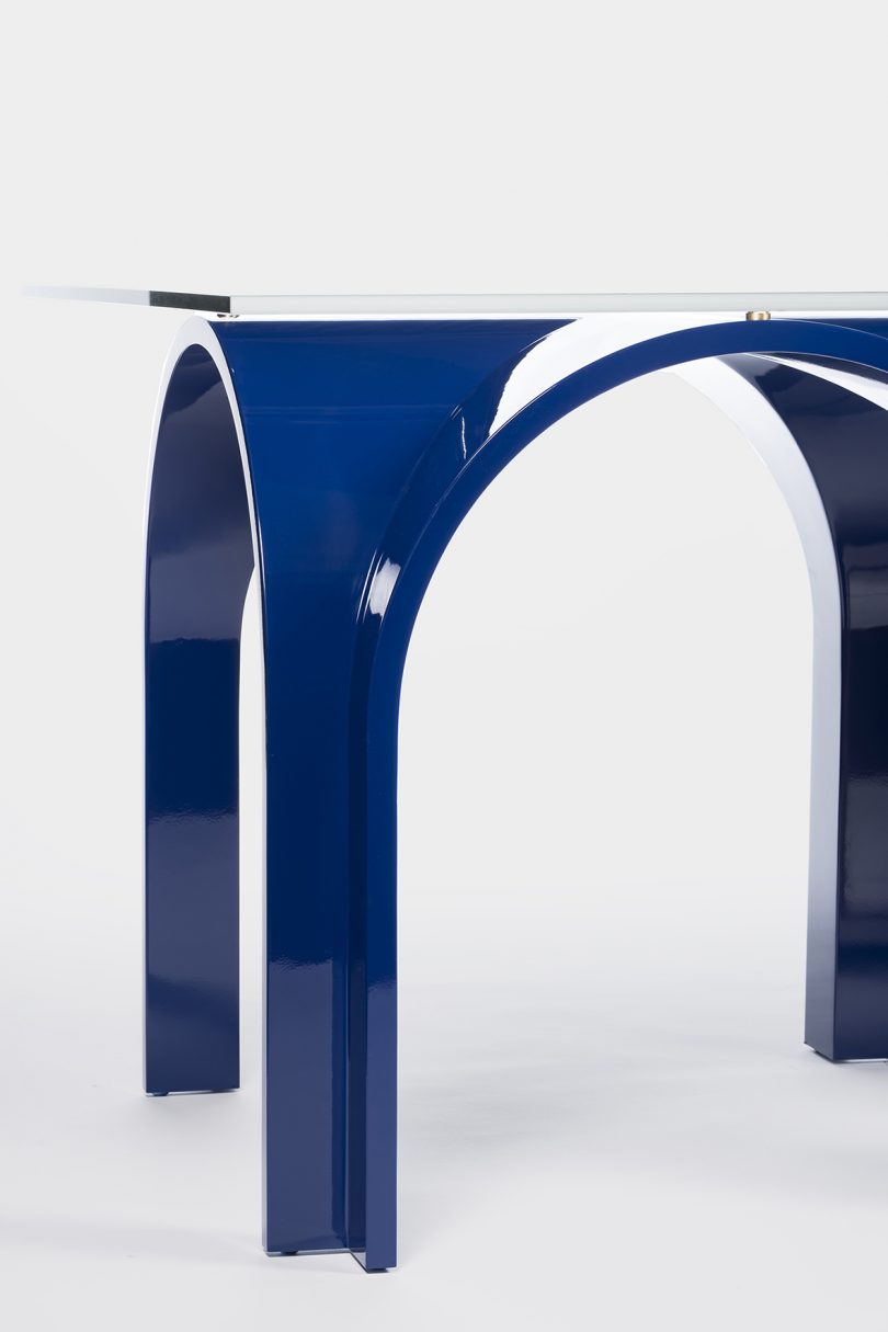 detail of blue rectangle dining table on white background