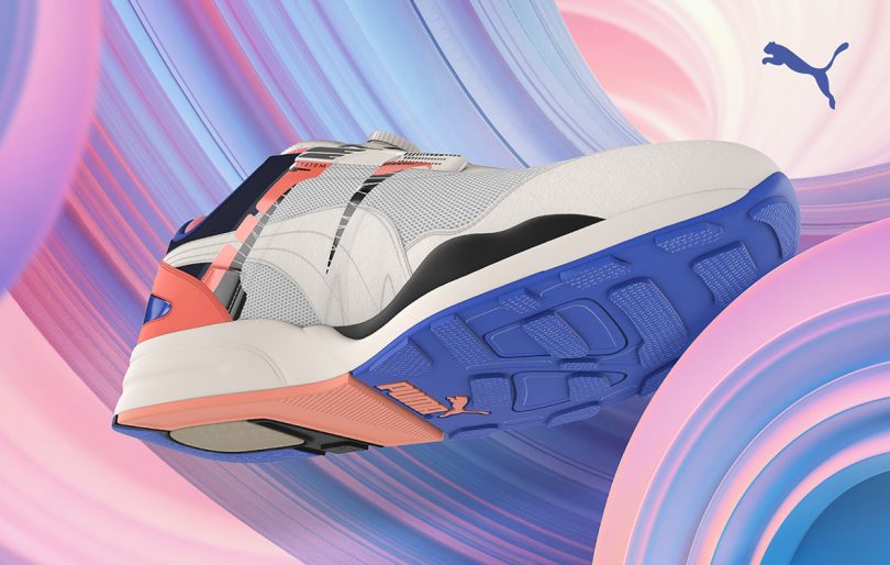 a long side view of a puma sneaker on colorful background