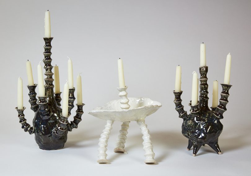 three freeform clay candleholders