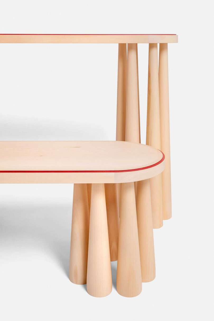 detail of light wood bench and high table on white background