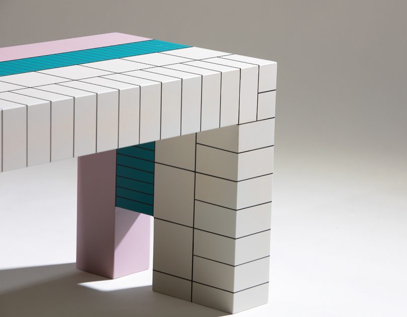 detail of modern white, teal, and lilac bench
