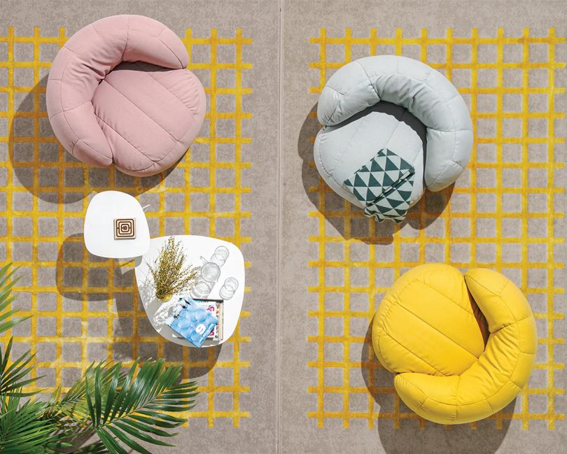 overhead photo of colorful plush armchairs