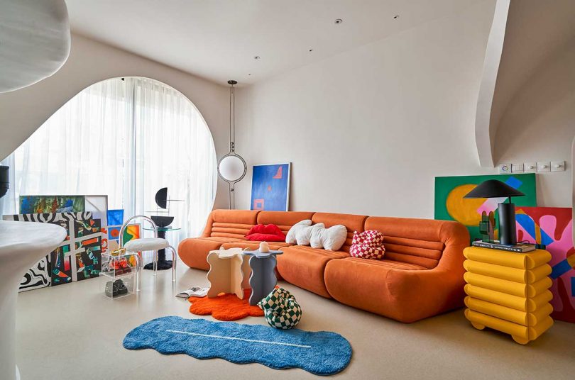 quirky modern interior with white walls and colorful furnishings