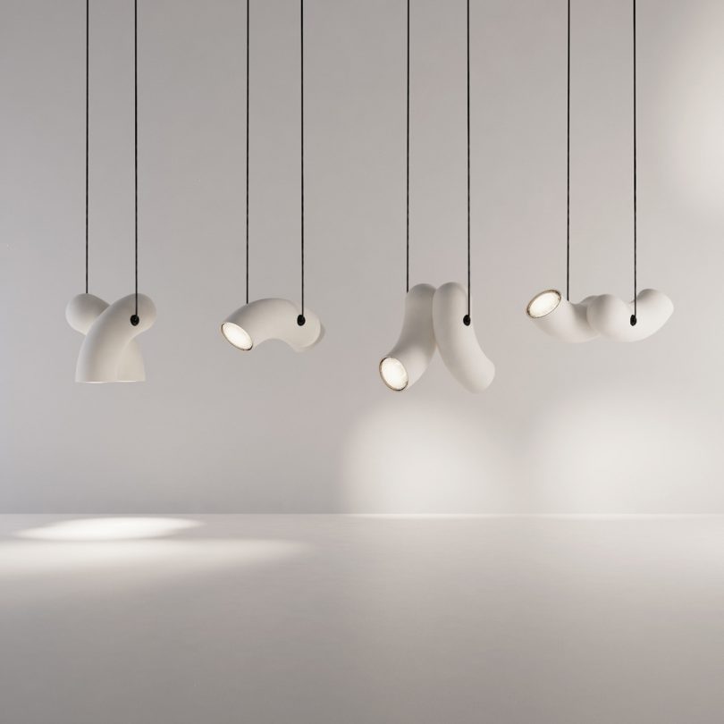 collection of white hyphen-shaped pendant lighting