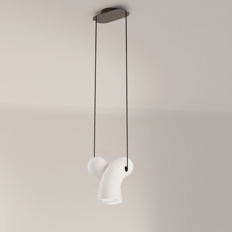 white hyphen-shaped pendant lighting