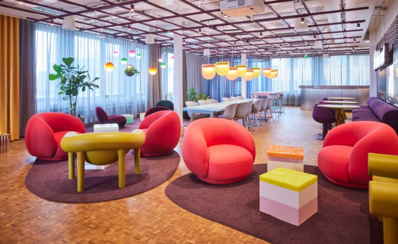 Modern office interior with colorful furnishings and fixtures
