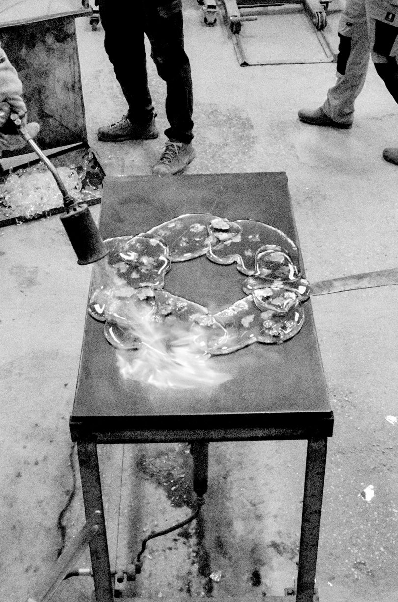 black and white photo of ring of molten glass
