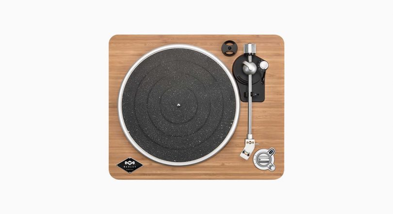 Top view of Stir It Up Wireless turntable, with bamboo top and black base against light gray background.