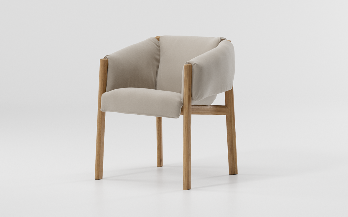 neutral colored upholstered armchair on white background