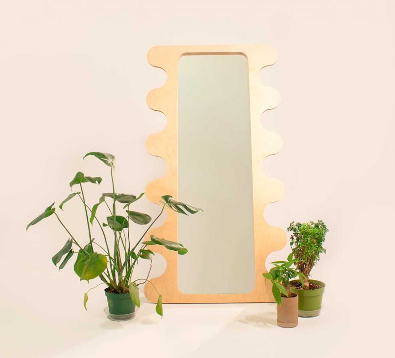 floor length wood mirror with curvy shaped frame