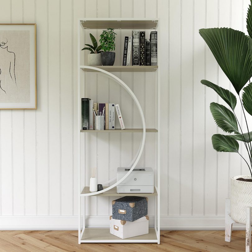 white geometric tall bookcase in styled interior space