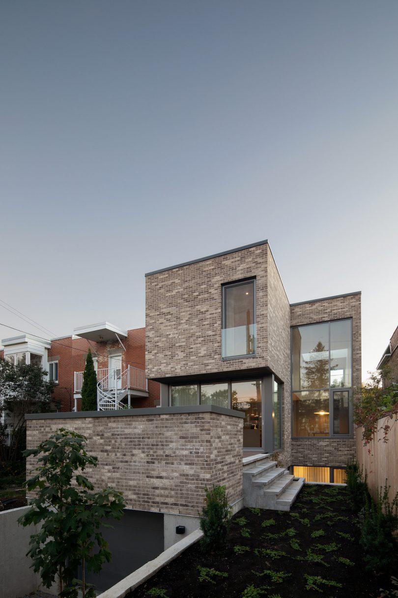 Brick facade allows the building to respectfully blend into its landscape