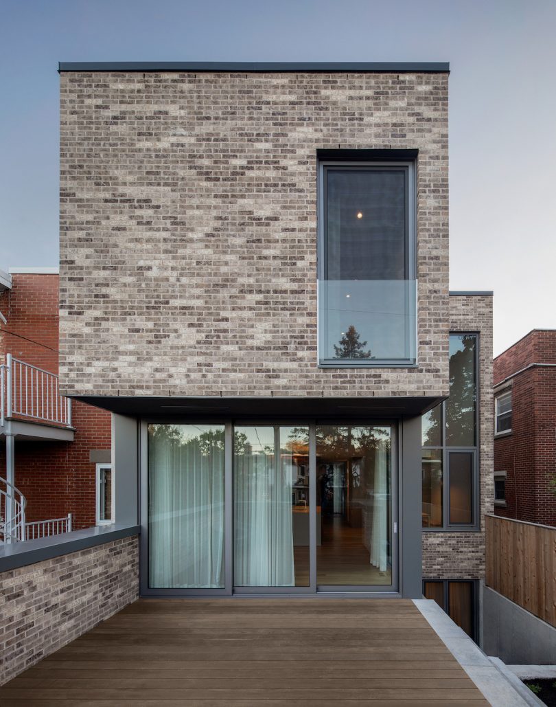 Brick facade allows the building to respectfully blend into its landscape