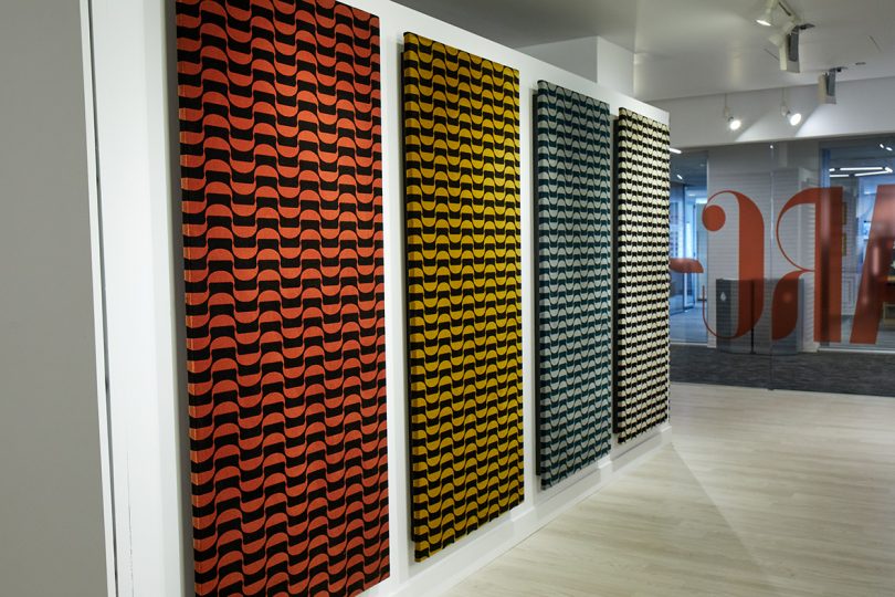 showroom with four wall panels of patterned fabric