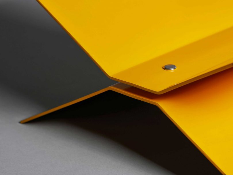 closeup view of bright yellow metal bookstand