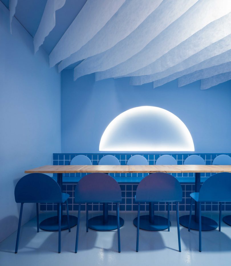 modern restaurant interior with blue hues