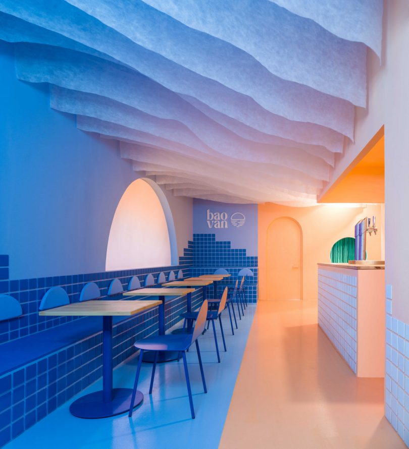 modern restaurant interior with half blue tones and half peach