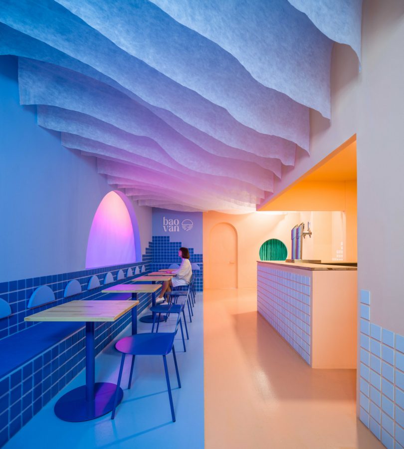 modern restaurant interior featuring blue and peach tones