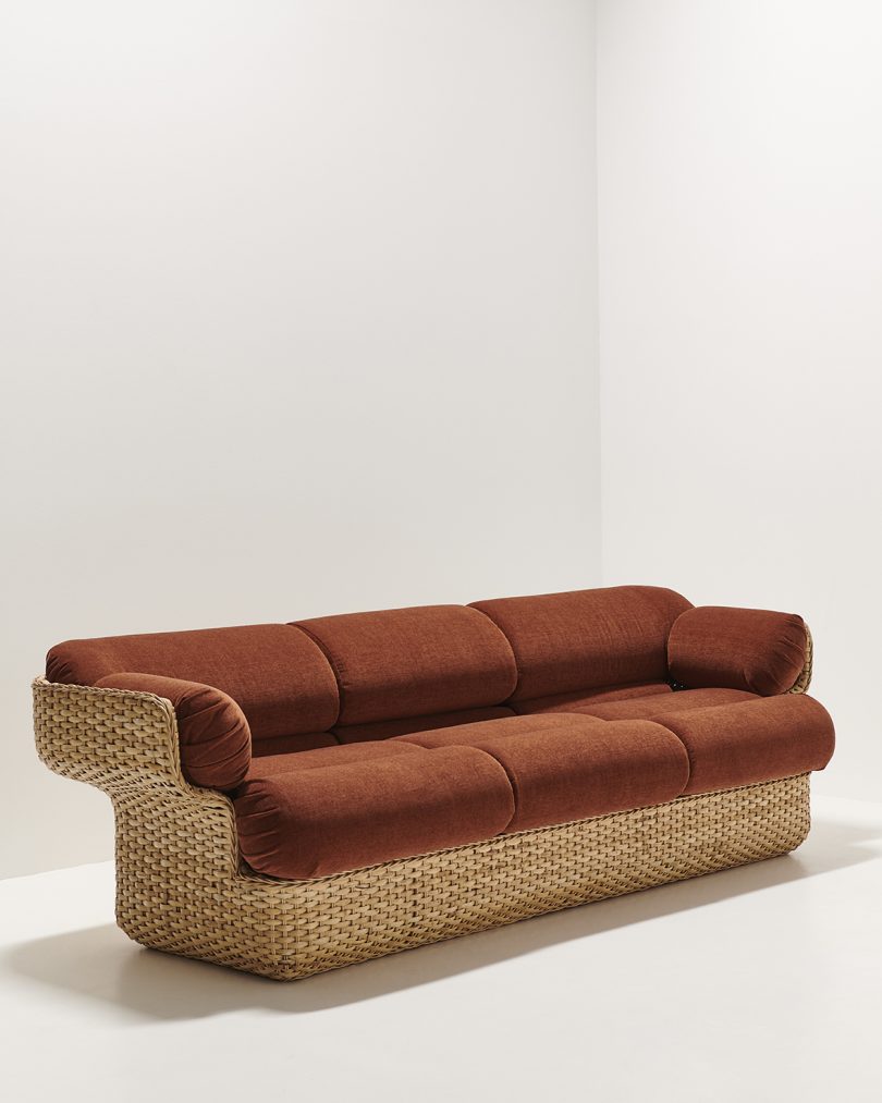 modern rattan sofa in front of white wall