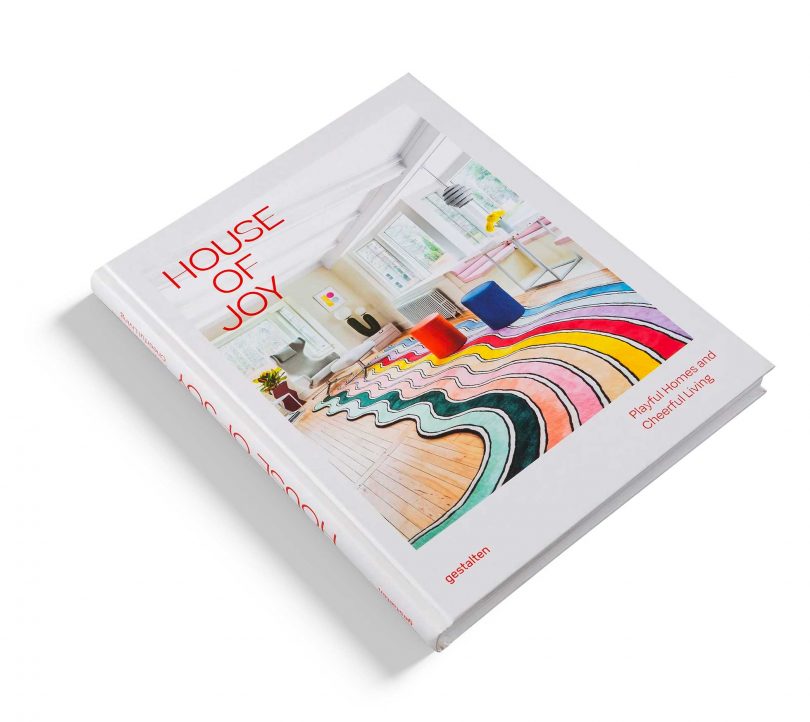 diagonal view of a coffee table book called "House of Joy"