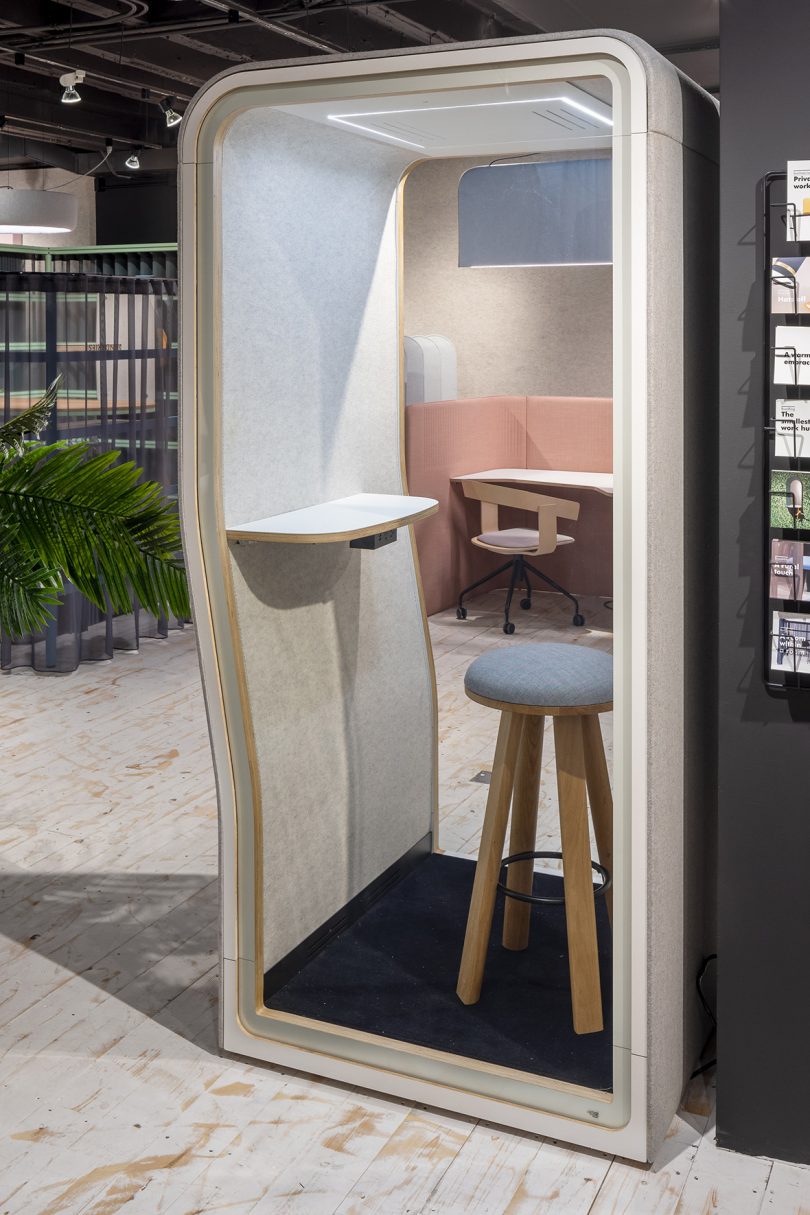 privacy booth with stool in showroom