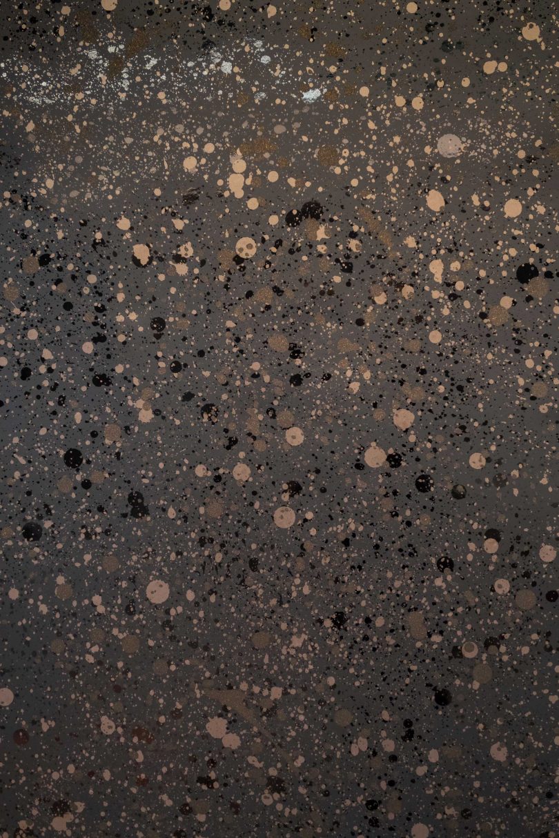 wallpaper design of metallic splattered design in black mylar