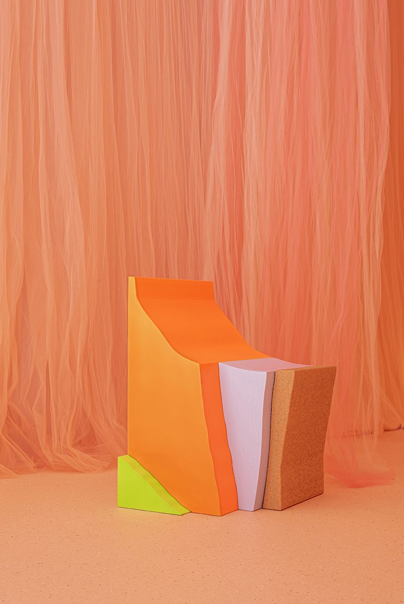 neon colored form against a peach colored background