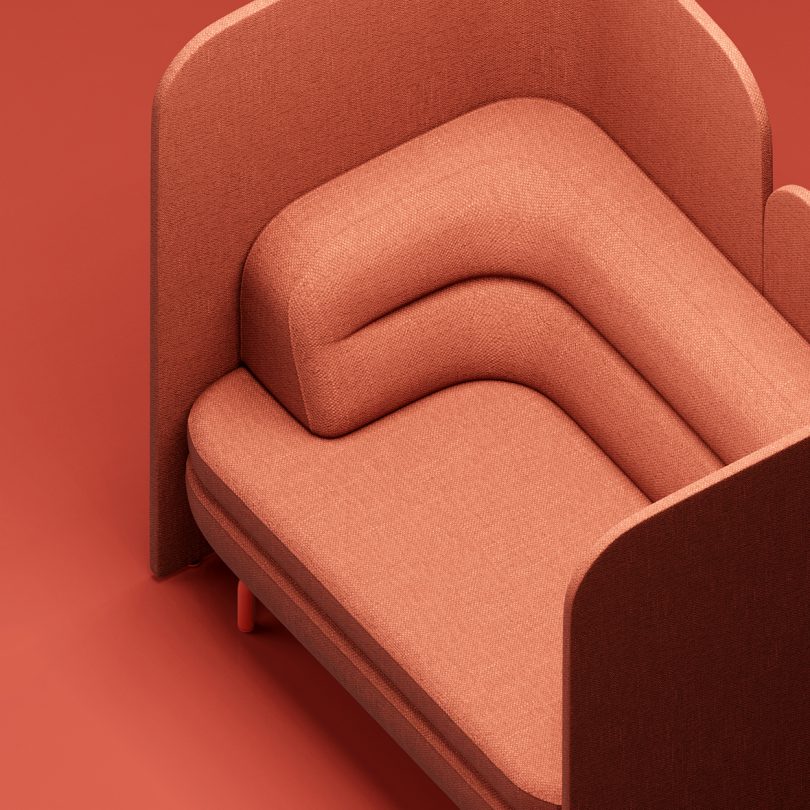 coral colored modular office cubicle against a matching background