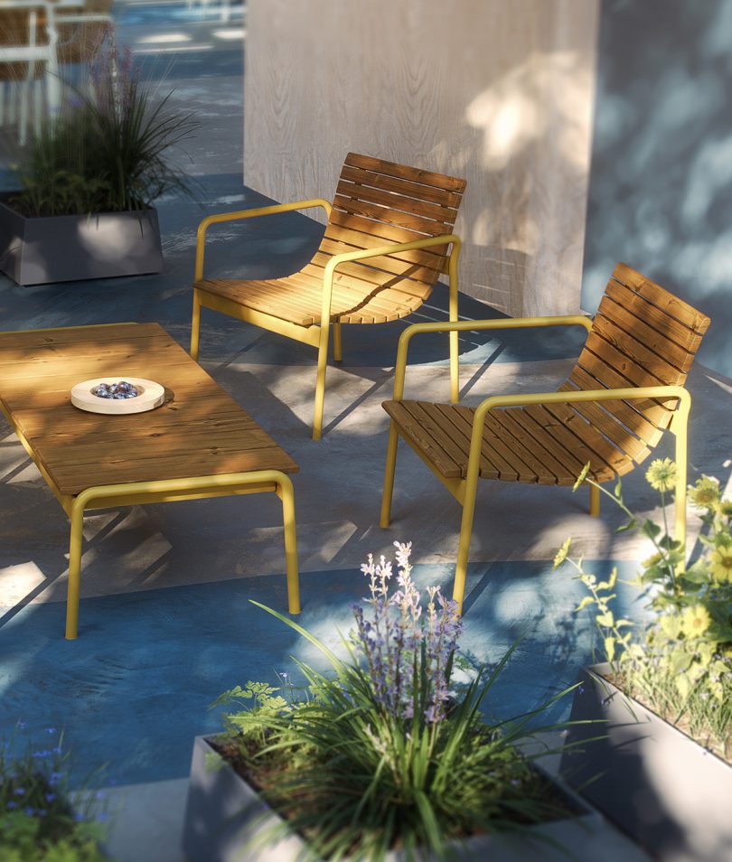 outdoor armchairs and coffee table on a shaded patio