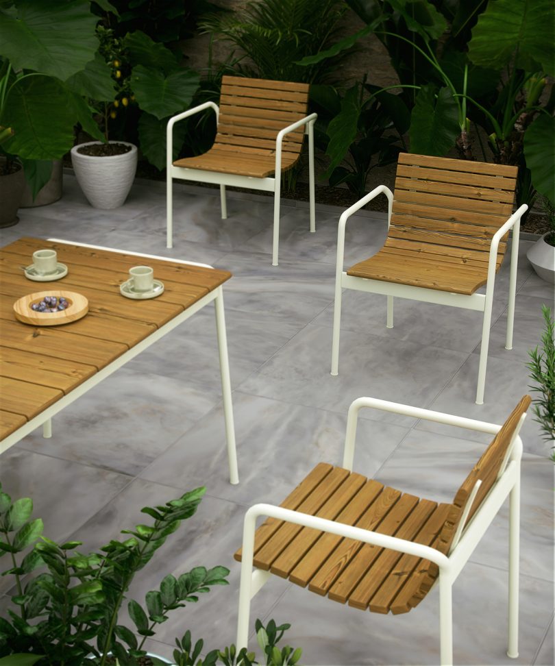 outdoor armchairs and coffee table on a shaded patio