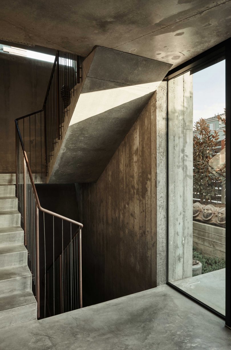 modern interior staircase with concrete surfaces