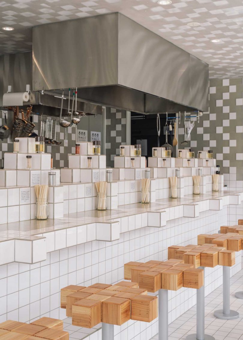restaurant interior of a pixelated white and gray design
