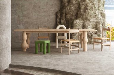 A Pair of Wood Dining Tables With Playful Legs