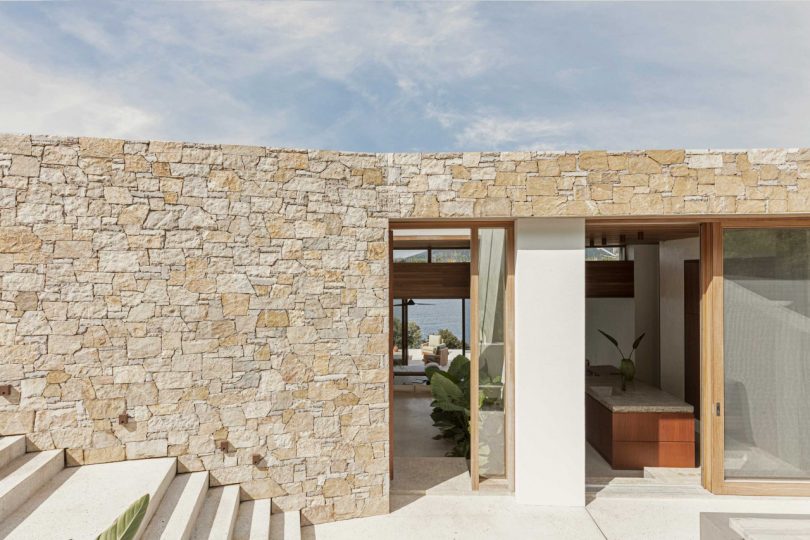 exterior view into stone clad house
