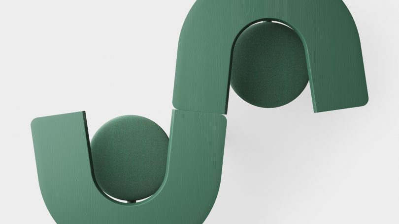 green swivel arm chair upclose