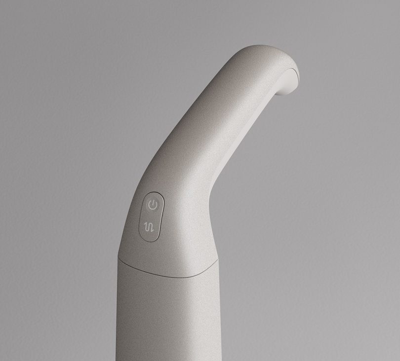 Close up of Actoplus Cordless Wet-Dry Vacuum Cleaner handle and power button control.