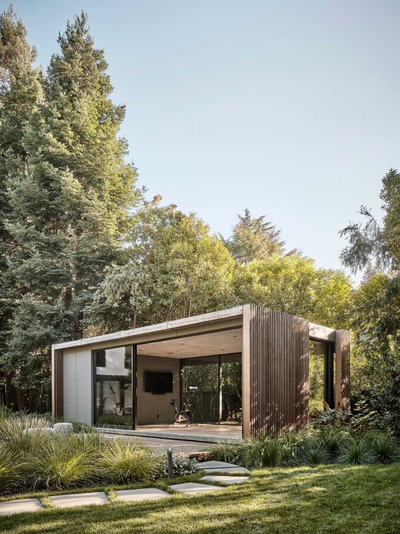 corner side exterior view of modern pavilion with walls up to outside