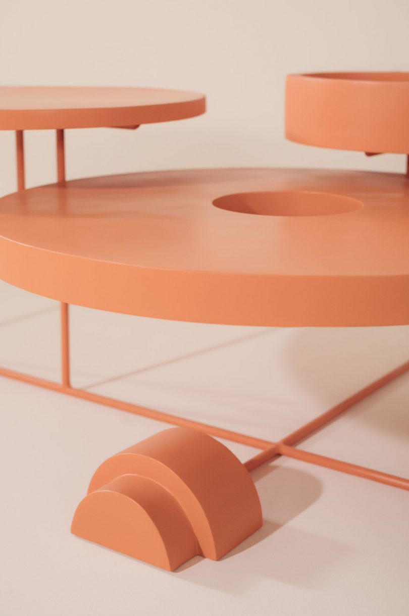 detail of a coral colored functional sculptural object