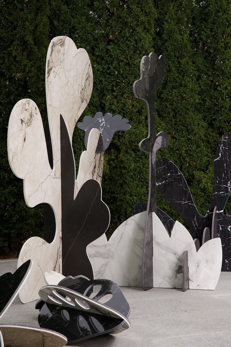black, white, and grey marble sculptures that resemble a garden