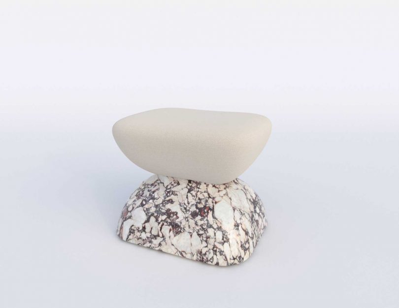 upholstered stool with marble base on white background