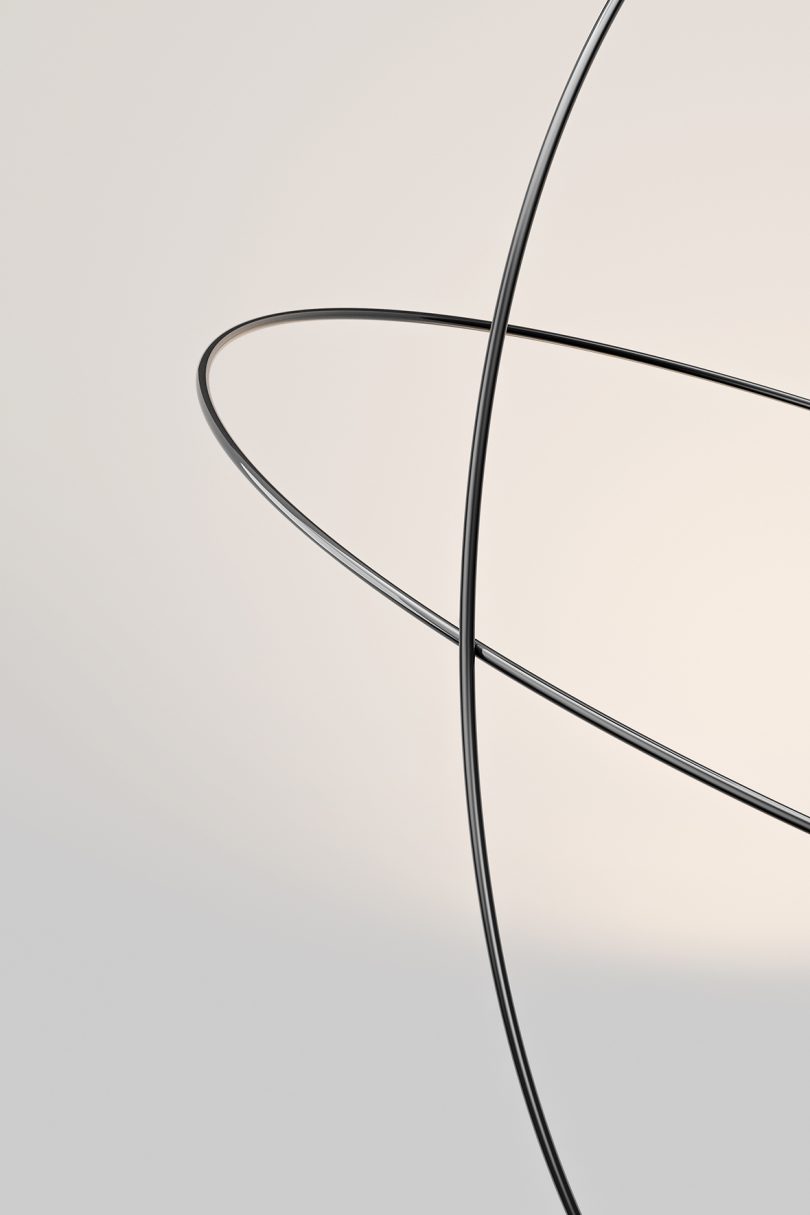 detail of a large orbit-like suspension lamp