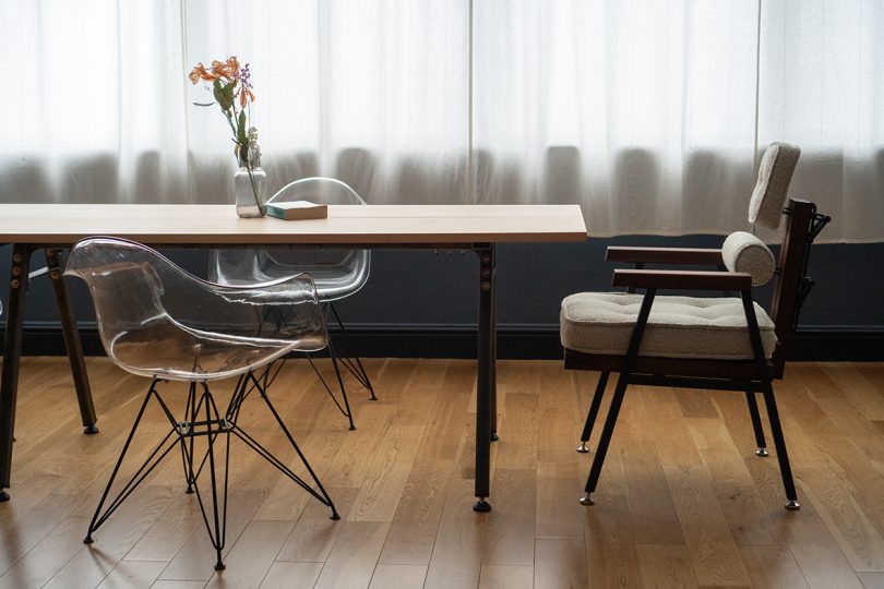 modern ergonomic chair placed in a styled interior dining space