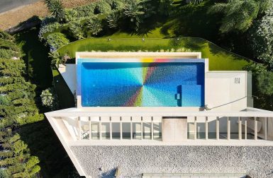 A Swimming Pool Becomes a Colorful Pinwheel Made of 130,000+ Tiles