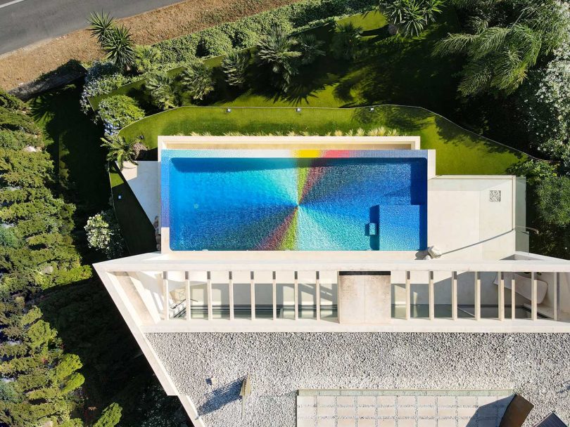 A Swimming Pool Becomes a Colorful Pinwheel Made of 130,000+ Tiles