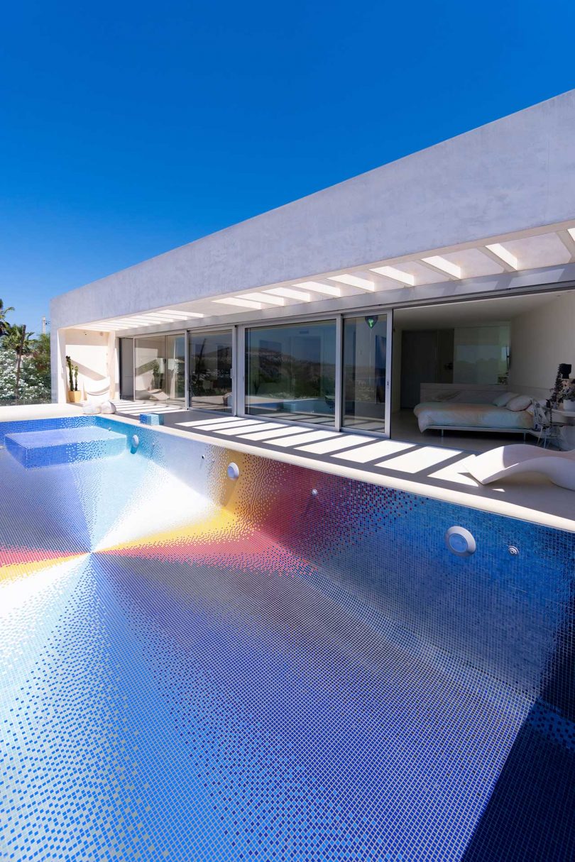 angled view of empty colorful mosaic swimming pool