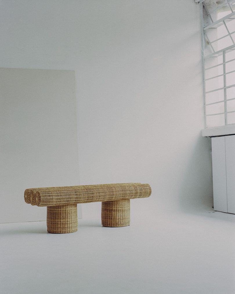 woven outdoor bench in white studio