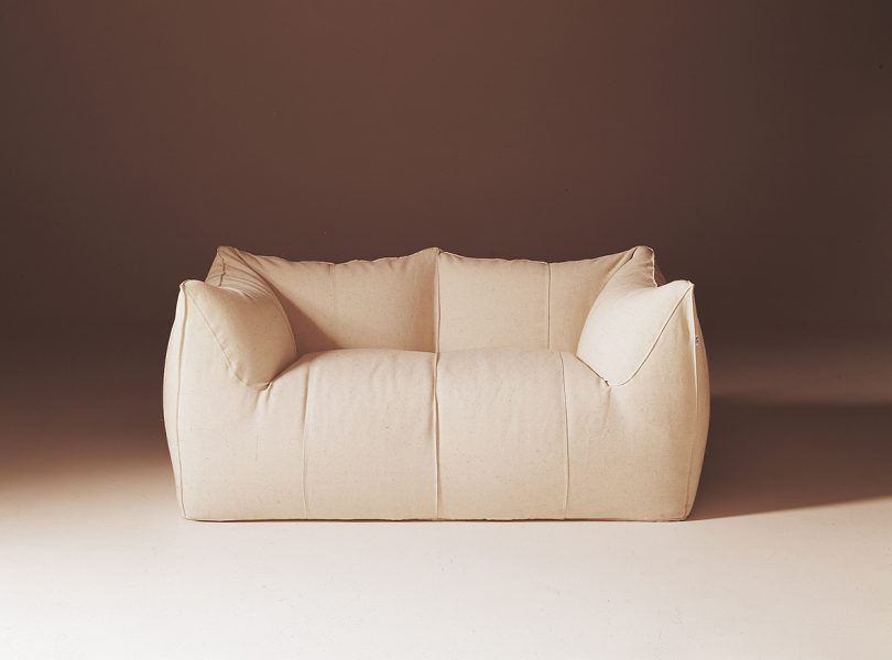 vintage image of a modern white 2-seater sofa