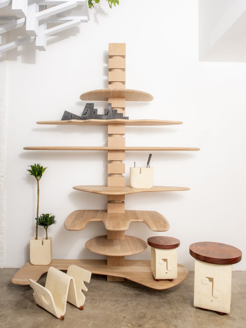modular wood shelving styled with stools