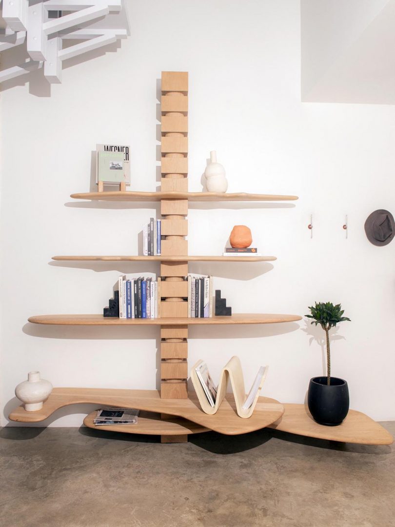modular wood shelving styled with books and objects