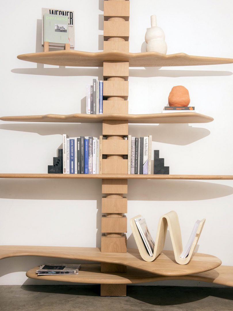 modular wood shelving styled with books and objects